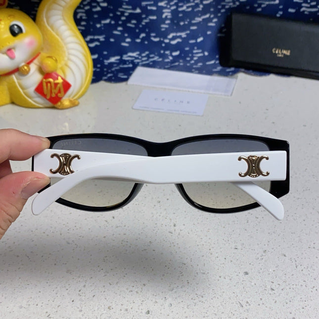 TRIOMPHE SUNGLASS 566216 IN BLACK AND WHITE ACETATE