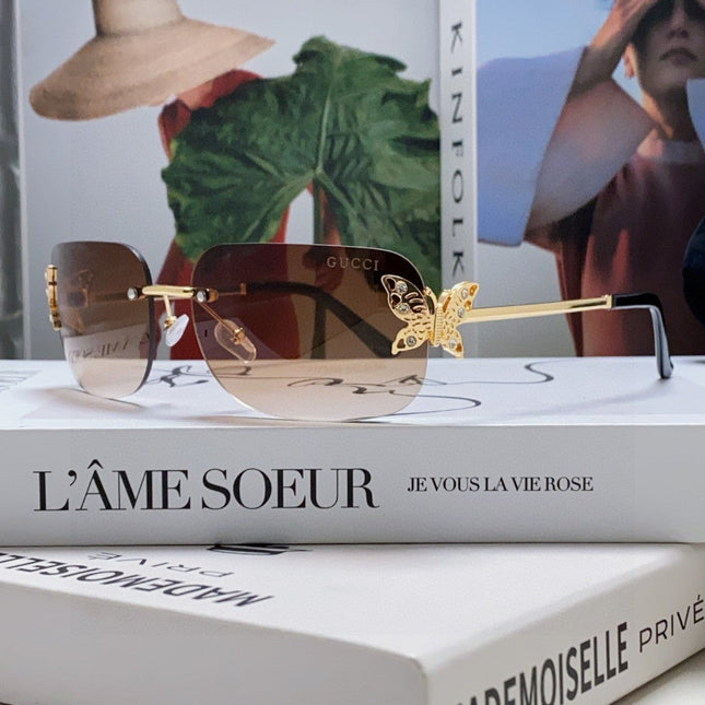 BUTTERFLY EMBELLISHED RIMLESS RECTANGULAR FRAME SUNGLASSES 570245 IN METAL