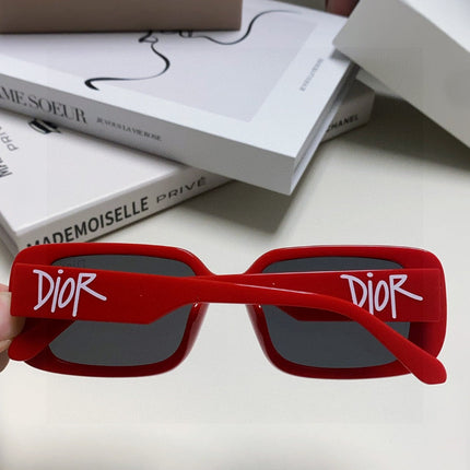MONTAIGNE SUNGLASS 571592 IN RED ACETATE TEXT LOGO