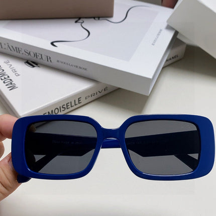MONTAIGNE SUNGLASS 571595 IN BLUE ACETATE TEXT LOGO