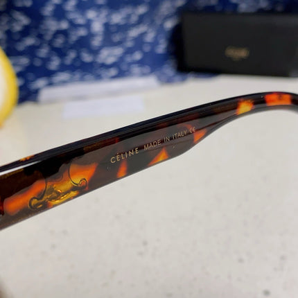 TRIOMPHE SUNGLASS 538531 IN HAVANA ACETATE BLACK LENSES