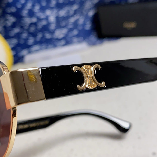 TRIOMPHE SUNGLASS 538532 IN BLACK ACETATE GOLD METAL