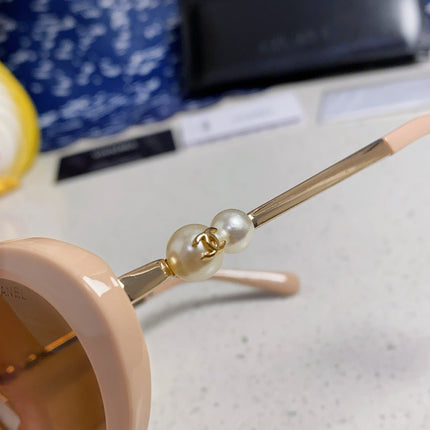 OVAL SUNGLASSES 640341 IN NUDE ACETATE METAL FRAME