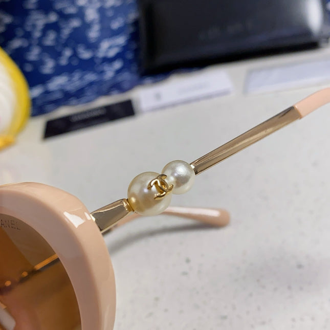 OVAL SUNGLASSES 640341 IN NUDE ACETATE METAL FRAME