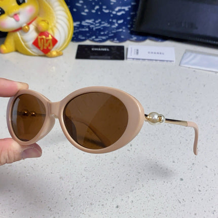 OVAL SUNGLASSES 640341 IN NUDE ACETATE METAL FRAME
