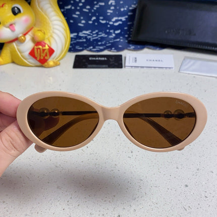 OVAL SUNGLASSES 640341 IN NUDE ACETATE METAL FRAME