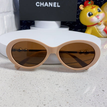 OVAL SUNGLASSES 640341 IN NUDE ACETATE METAL FRAME