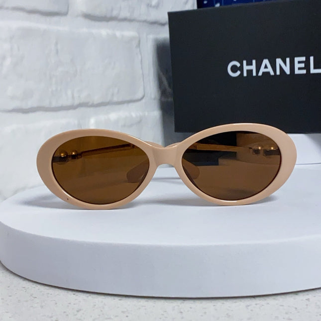 OVAL SUNGLASSES 640341 IN NUDE ACETATE METAL FRAME