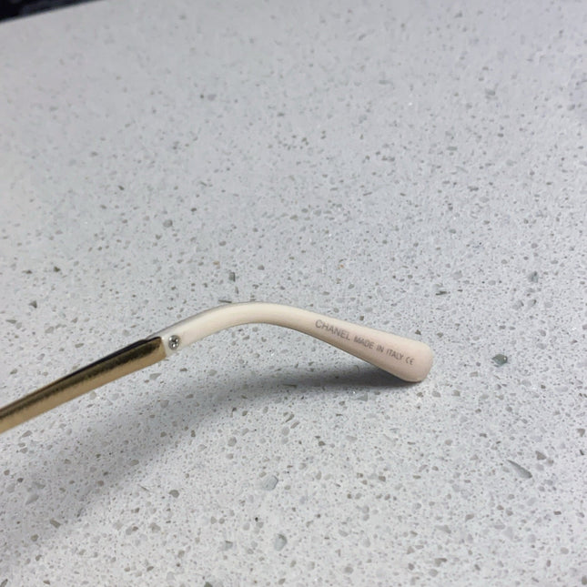 OVAL SUNGLASSES 640343 IN IVORY BROWN ACETATE METAL FRAME EMBOSSED PEARL