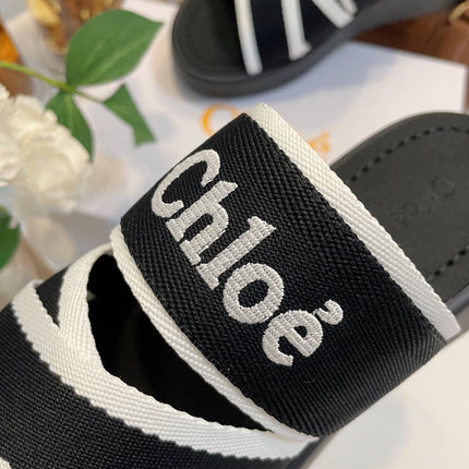 CHLOÉ WOODY WEDGE SANDALS IN BLACK MIX WHITE CANVAS WITH RUBBER SOLE