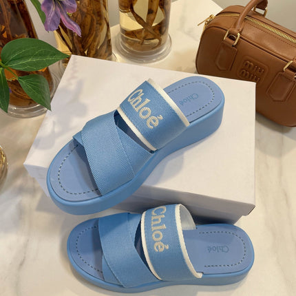 CHLOÉ WOODY WEDGE SANDALS IN CERULEAN BLUE CANVAS WITH RUBBER SOLE