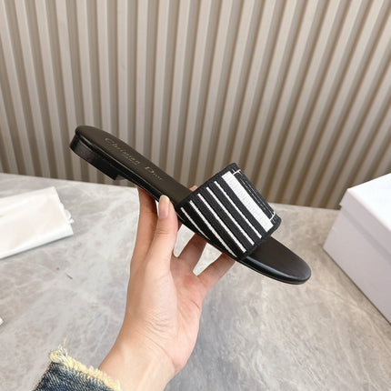 DIOR FLAT SLIDES 25S IN BLACK CALFSKIN AND FABRIC BRAND NAME EMBROIDERY