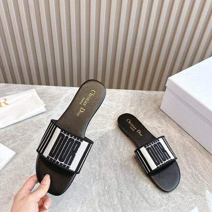 DIOR FLAT SLIDES 25S IN BLACK CALFSKIN AND FABRIC BRAND NAME EMBROIDERY