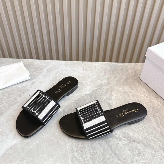 DIOR FLAT SLIDES 25S IN BLACK CALFSKIN AND FABRIC BRAND NAME EMBROIDERY
