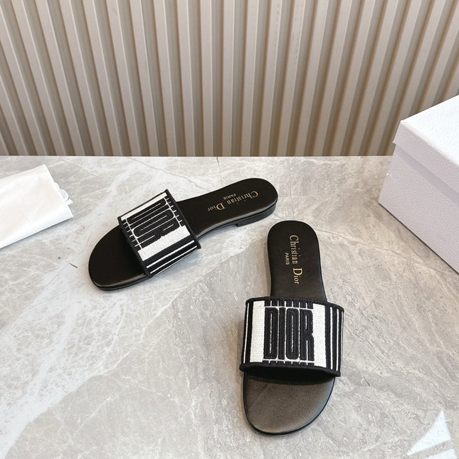 DIOR FLAT SLIDES 25S IN BLACK CALFSKIN AND FABRIC BRAND NAME EMBROIDERY