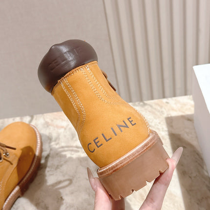 CELINE 25S MARTIN BOOTS IN MEDIUM ORANGE CALFSKIN
