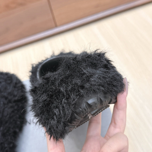BALENCIAGA 25S MULES IN BLACK FAUX FUR