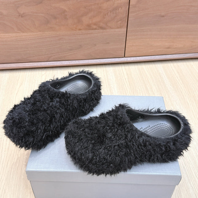 BALENCIAGA 25S MULES IN BLACK FAUX FUR