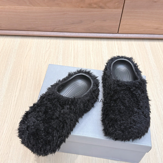 BALENCIAGA 25S MULES IN BLACK FAUX FUR