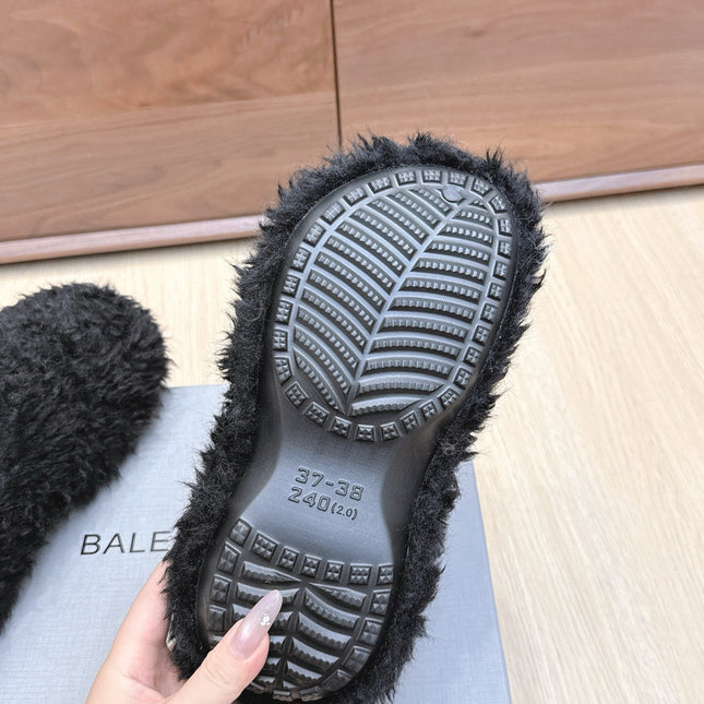 BALENCIAGA 25S MULES IN BLACK FAUX FUR