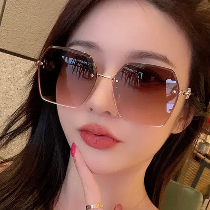 MONTAIGNE SUNGLASS CD3022 IN BROWN METAL