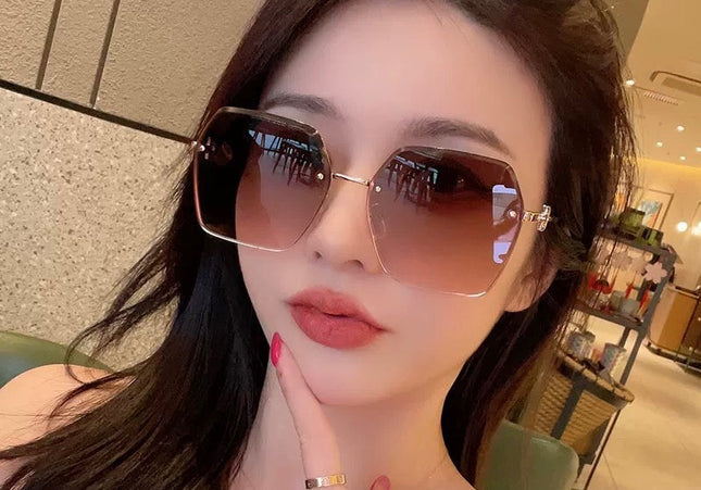 MONTAIGNE SUNGLASS CD3022 IN BROWN METAL