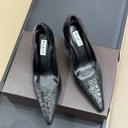 ALAIA 25S POINTY TOE PUMPS 90MM IN BLACK CALFSKIN