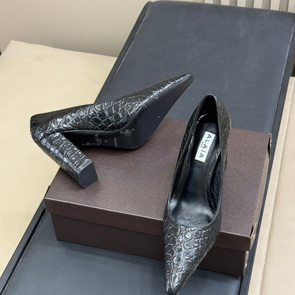 ALAIA 25S POINTY TOE PUMPS 90MM IN BLACK CALFSKIN