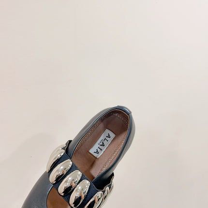 ALAIA TRIBALE BALLET FLATS IN BLACK LAMBSKIN