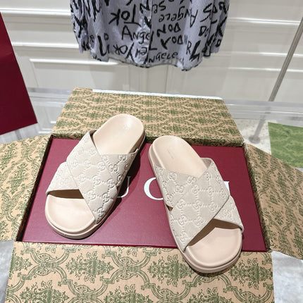 GG SLIDES IN NUDE BEIGE SUEDE WITH EMBOSSED LOGO STYLE 7