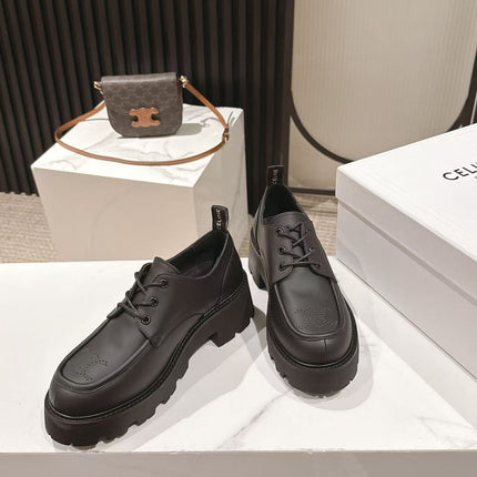 CELINE 25S THICK SOLED LOAFERS 50MM IN BLACK CALFSKIN