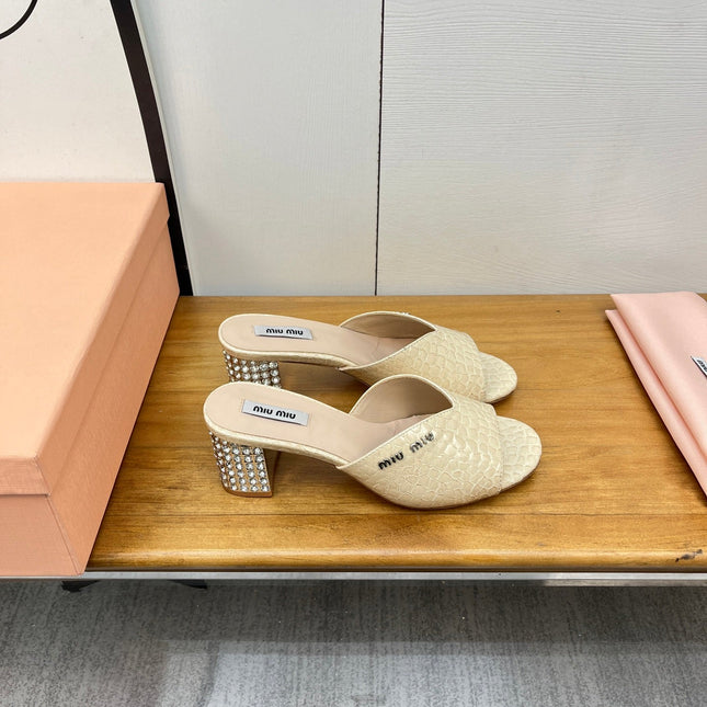 JEWELLED HEEL 55 MULE SANDALS IN PALE YELLOW CALFSKIN