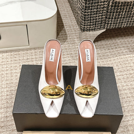 ALAIA SPIKE JEWEL MULES IN WHITE CALFSKIN WITH GOLD HARDWARE