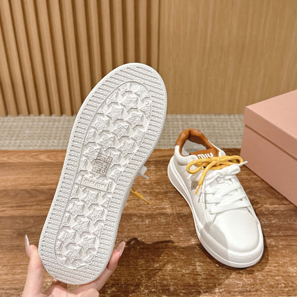 MM SNEAKERS IN WHITE CALFSKIN WITH YELLOW LACES