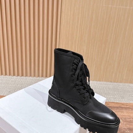 TRIOMPHE LACE-UP ANKLE BOOT IN BLACK CANVAS