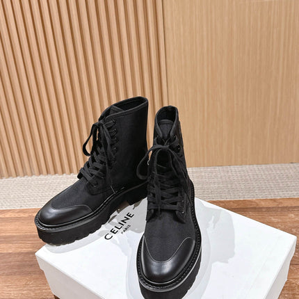TRIOMPHE LACE-UP ANKLE BOOT IN BLACK CANVAS