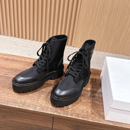 TRIOMPHE LACE-UP ANKLE BOOT IN BLACK CANVAS