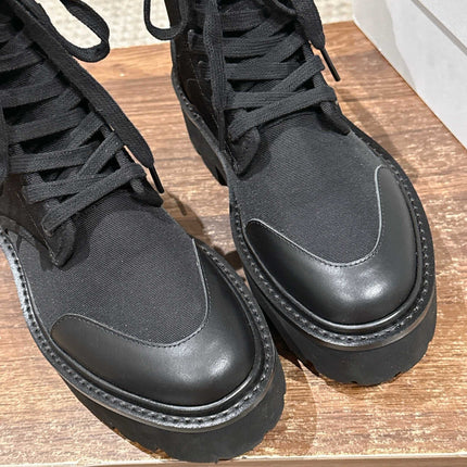 TRIOMPHE LACE-UP ANKLE BOOT IN BLACK CANVAS