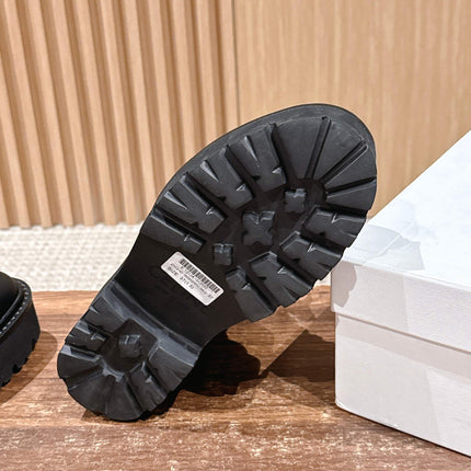 TRIOMPHE LACE-UP ANKLE BOOT IN BLACK CANVAS