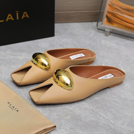 ALAIA FLAT MULE IN SEPIA TAN LAMBSKIN WITH GOLD HARDWARE