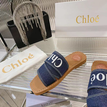 CHLOÉ WOODY MULE IN NAVY BLUE DENIM WITH WHITE LOGO