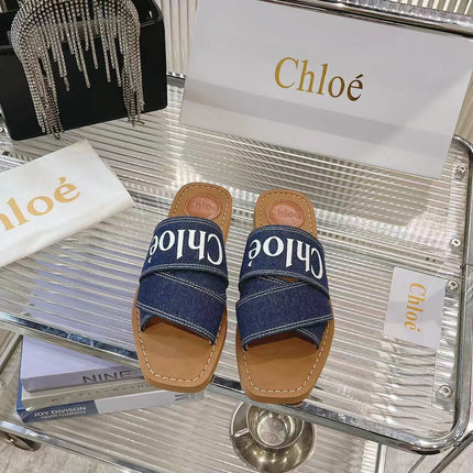 CHLOÉ WOODY MULE IN NAVY BLUE DENIM WITH WHITE LOGO