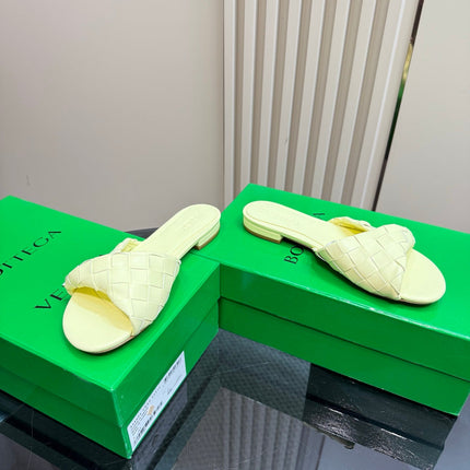BLINK FLAT MULE IN PASTEL YELLOW INTRECCIATO LEATHER