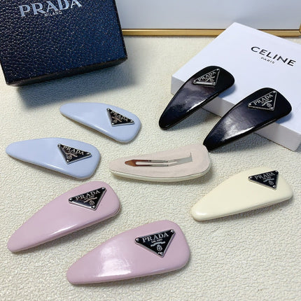 A PAIR OF HAIR CLIPS IN BLUE PASTEL GLOSSY LAMBSKIN 201554