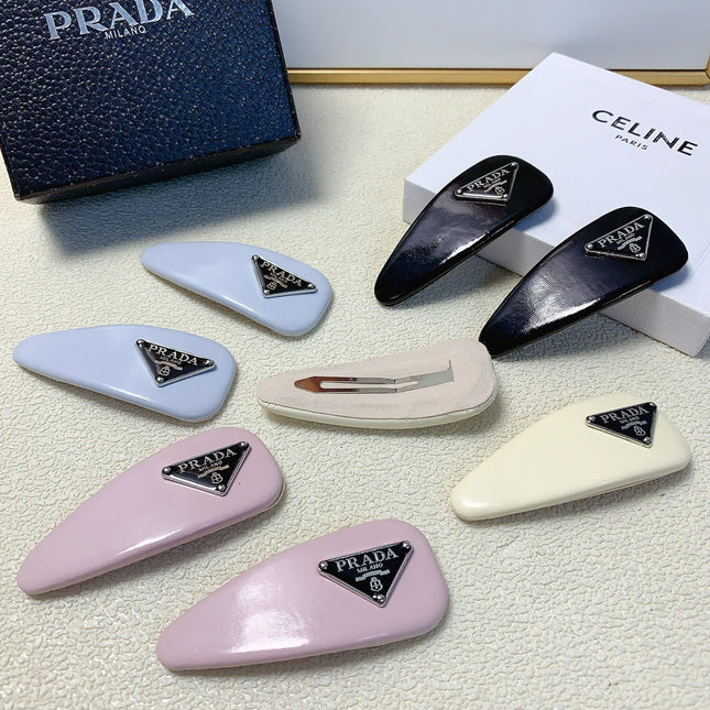 A PAIR OF HAIR CLIPS IN BLUE PASTEL GLOSSY LAMBSKIN 201554