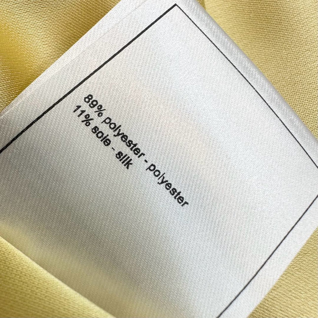 CHANEL SLEEVELESS ROUND-NECK BUTTON-UP TOP 274771