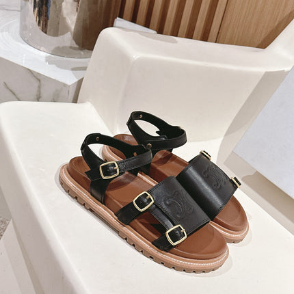 FLAT SANDALS IN BLACK TRIOMPHE EMBOSSED SMOOTH CALFSKIN