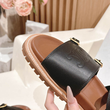 FLAT SANDALS IN BLACK TRIOMPHE EMBOSSED SMOOTH CALFSKIN