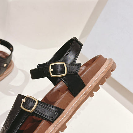 FLAT SANDALS IN BLACK TRIOMPHE EMBOSSED SMOOTH CALFSKIN