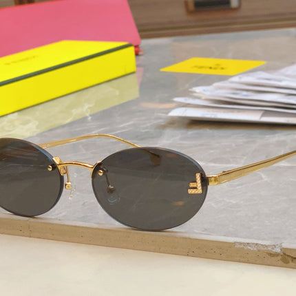 FIRST CRYSTAL OVAL FRAME SUNGLASSES FE4075US IN METAL